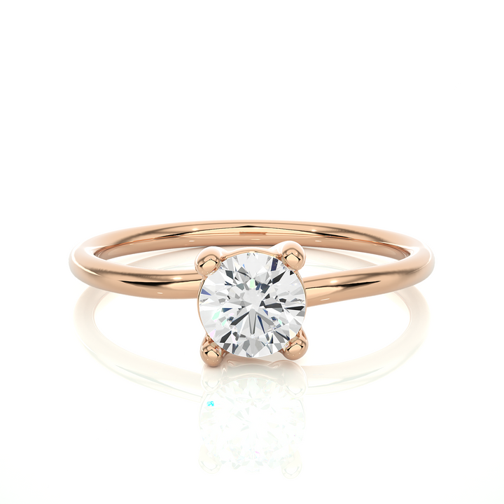 A HALF CARAT 4 PRONG RING