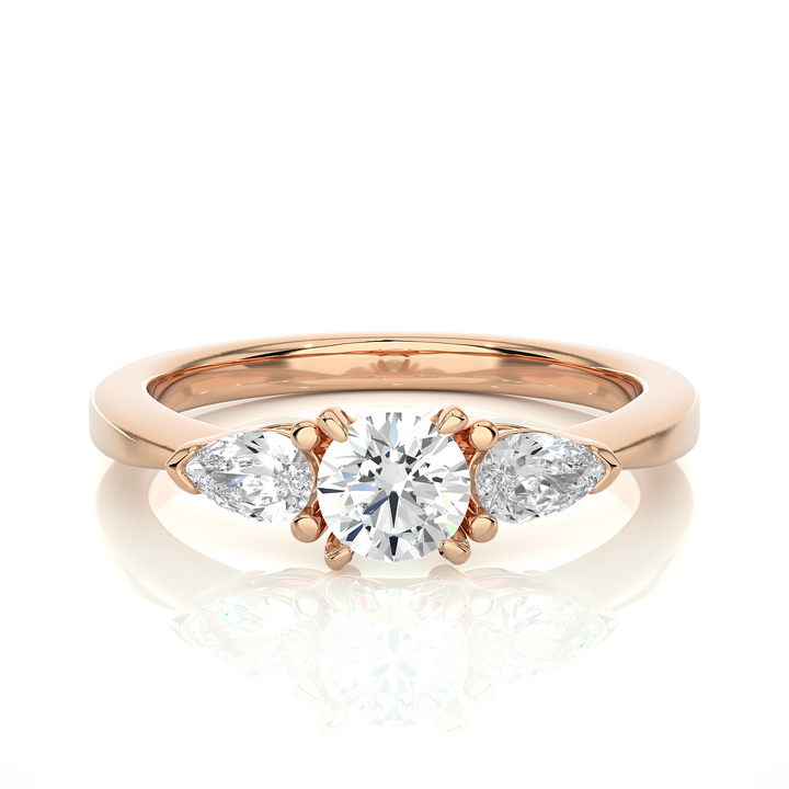 TRILOGY DIAMOND RING SET WITH ROUND DIAMOND IN CENTER , PEARS ON SIDES