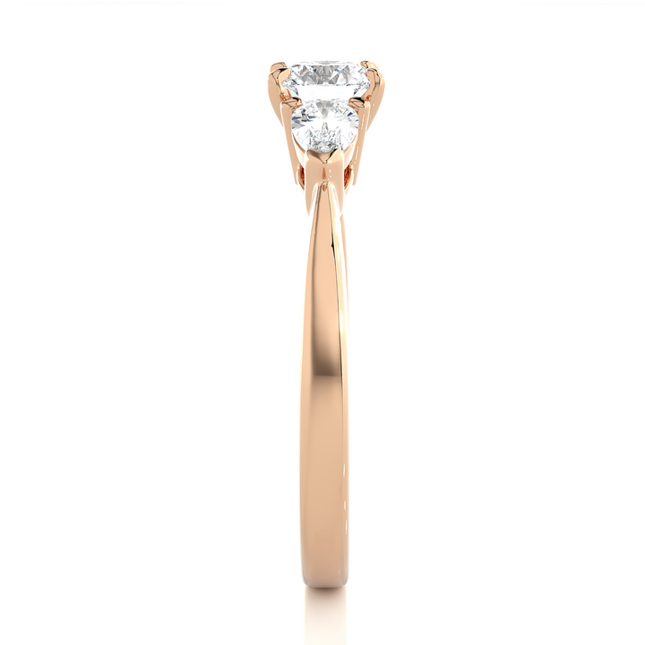 TRILOGY DIAMOND RING SET WITH ROUND DIAMOND IN CENTER , PEARS ON SIDES