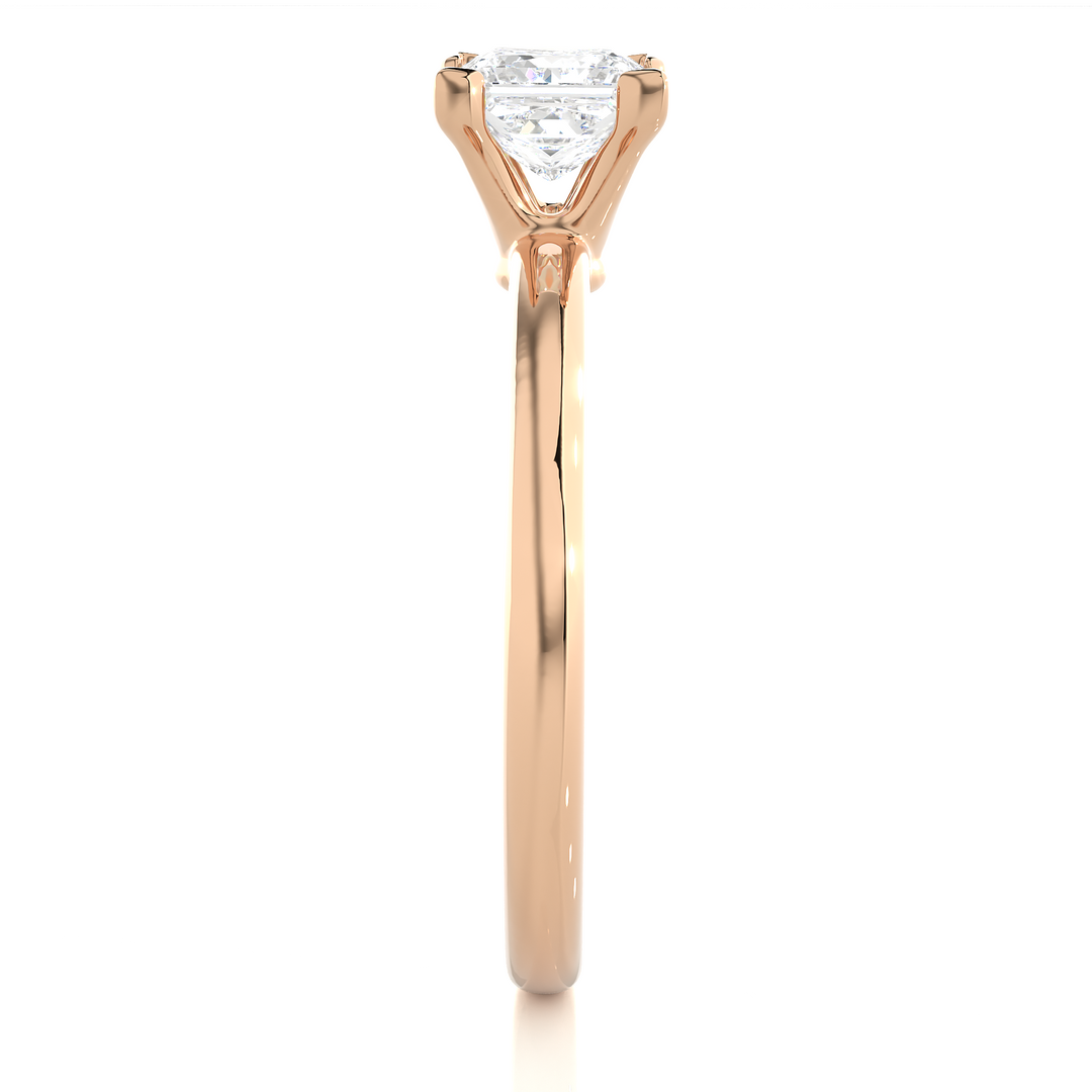 A SOLITAIRE PRINCESS  DIAMOND RING  IN PRONG SETTING