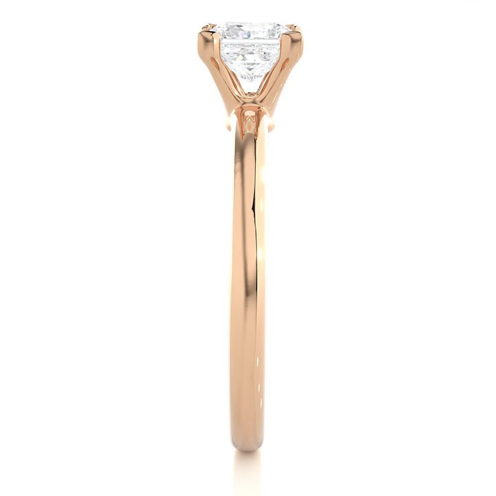 A SOLITAIRE PRINCESS  DIAMOND RING  IN PRONG SETTING