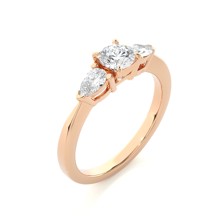TRILOGY DIAMOND RING SET WITH ROUND DIAMOND IN CENTER , PEARS ON SIDES
