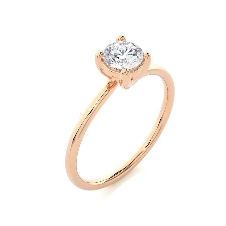 A HALF CARAT 4 PRONG RING