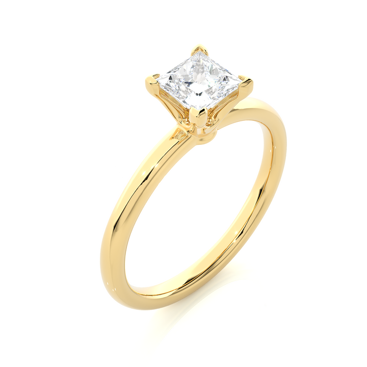A SOLITAIRE PRINCESS  DIAMOND RING  IN PRONG SETTING
