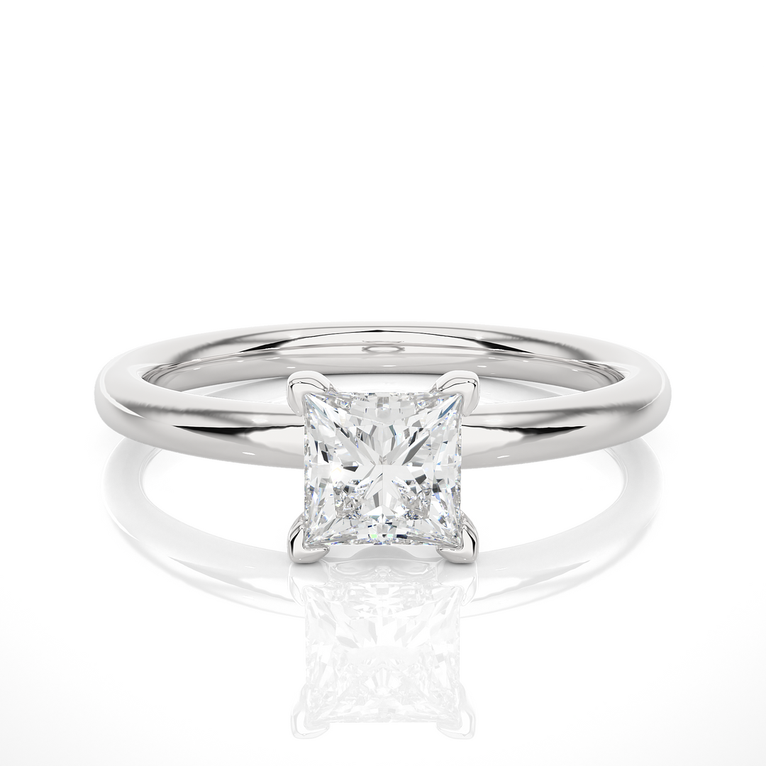A SOLITAIRE PRINCESS  DIAMOND RING  IN PRONG SETTING