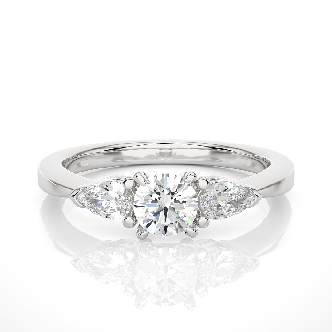 TRILOGY DIAMOND RING SET WITH ROUND DIAMOND IN CENTER , PEARS ON SIDES