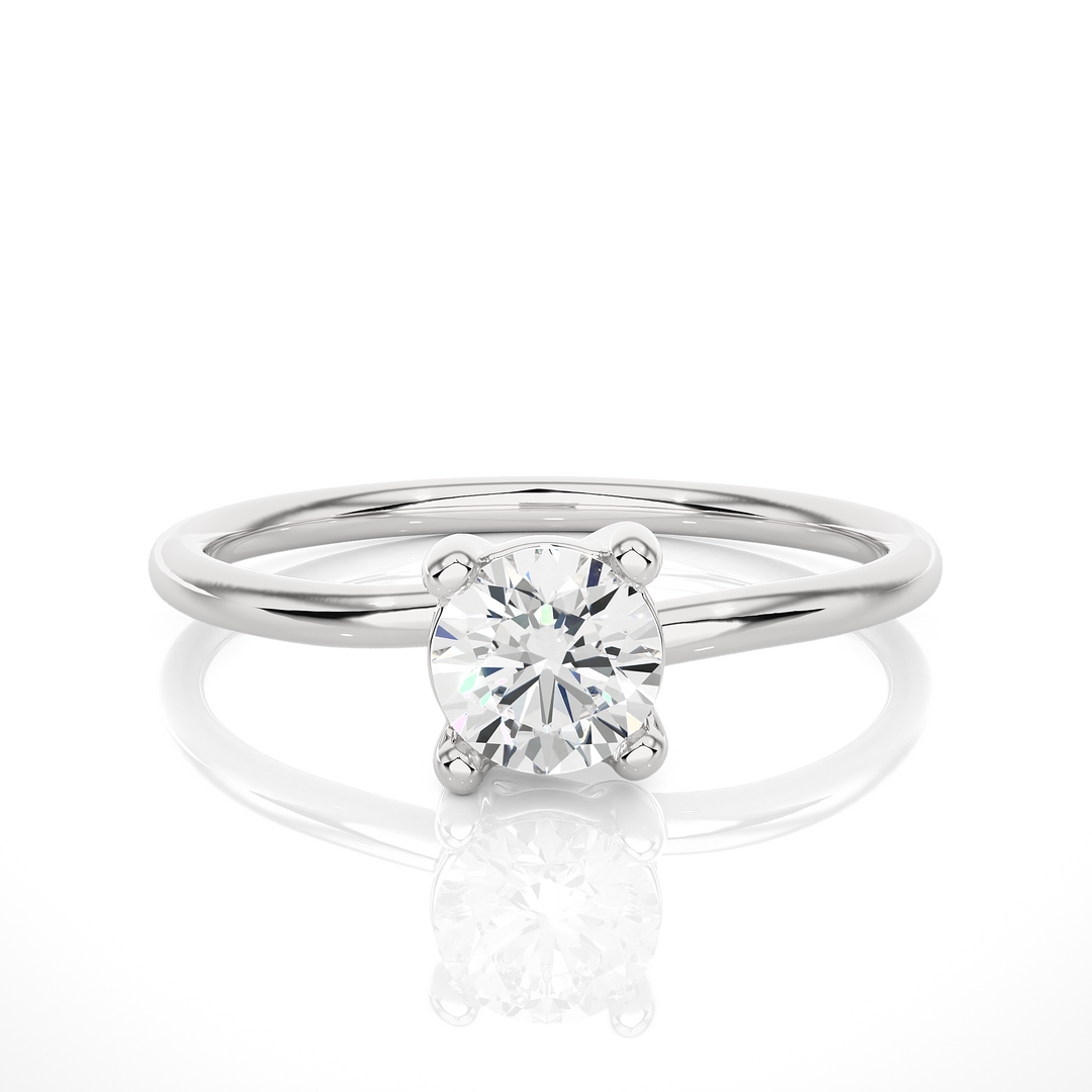 A HALF CARAT 4 PRONG RING