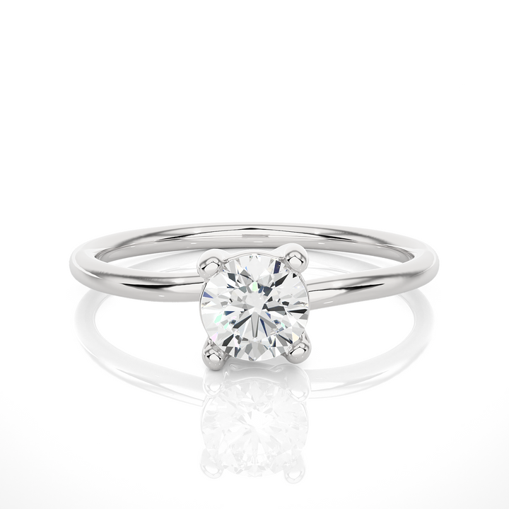 A HALF CARAT 4 PRONG RING