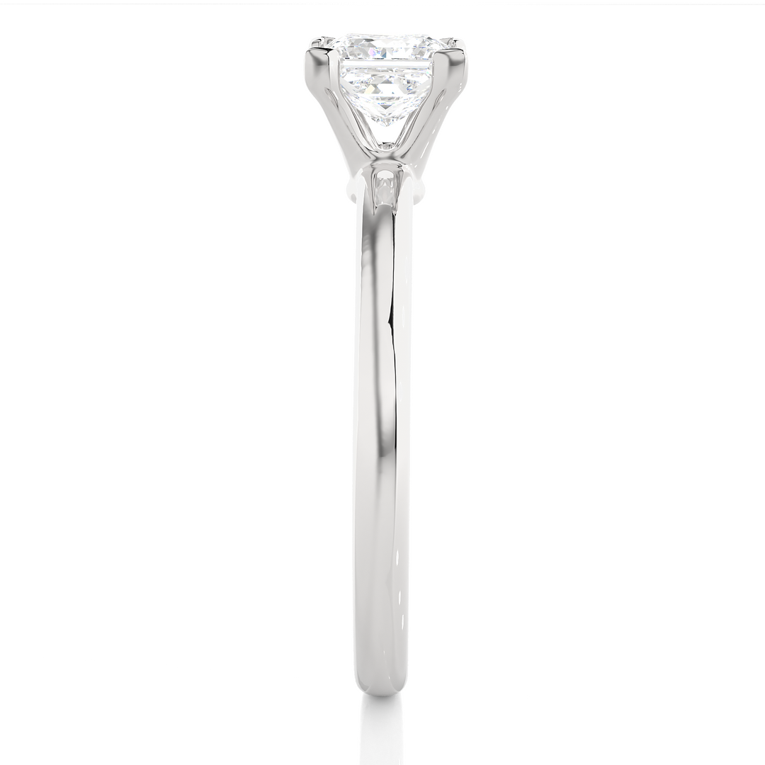 A SOLITAIRE PRINCESS  DIAMOND RING  IN PRONG SETTING