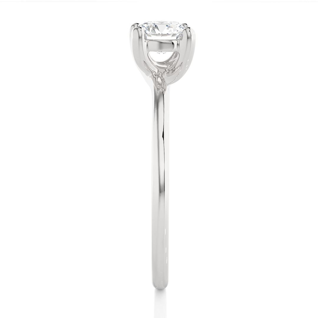 A HALF CARAT 4 PRONG RING