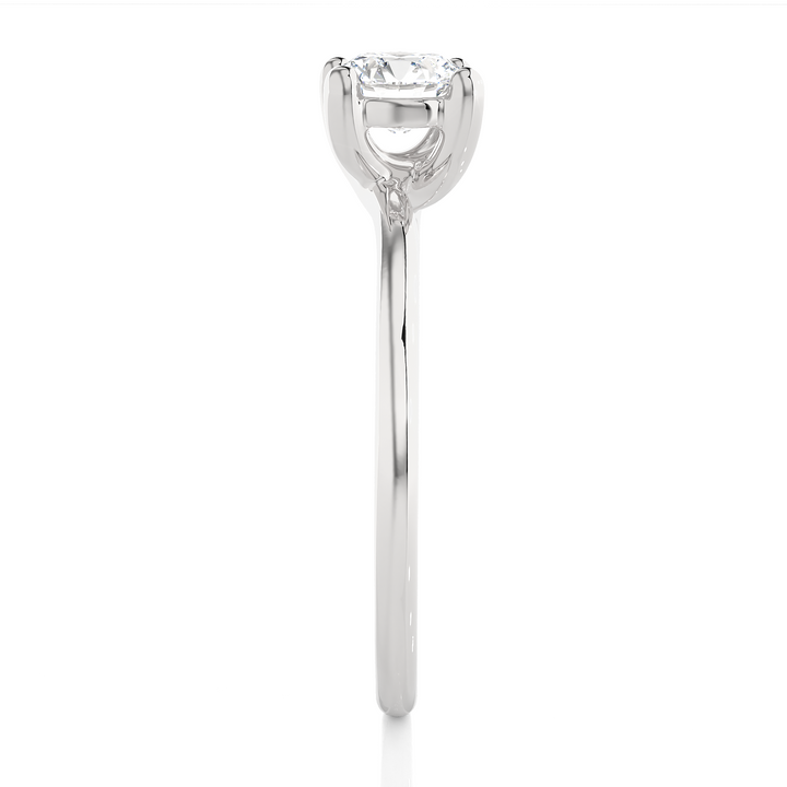 A HALF CARAT 4 PRONG RING