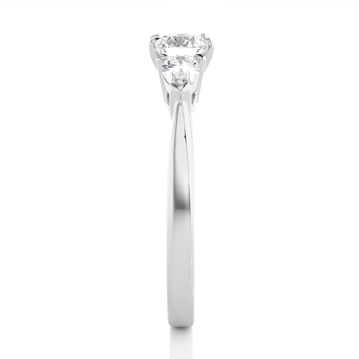 TRILOGY DIAMOND RING SET WITH ROUND DIAMOND IN CENTER , PEARS ON SIDES