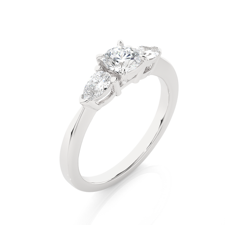 TRILOGY DIAMOND RING SET WITH ROUND DIAMOND IN CENTER , PEARS ON SIDES