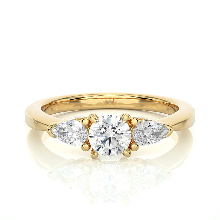 TRILOGY DIAMOND RING SET WITH ROUND DIAMOND IN CENTER , PEARS ON SIDES