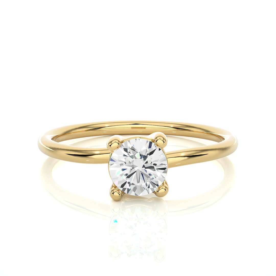 A HALF CARAT 4 PRONG RING