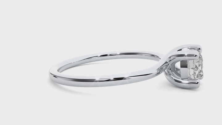 A HALF CARAT 4 PRONG RING