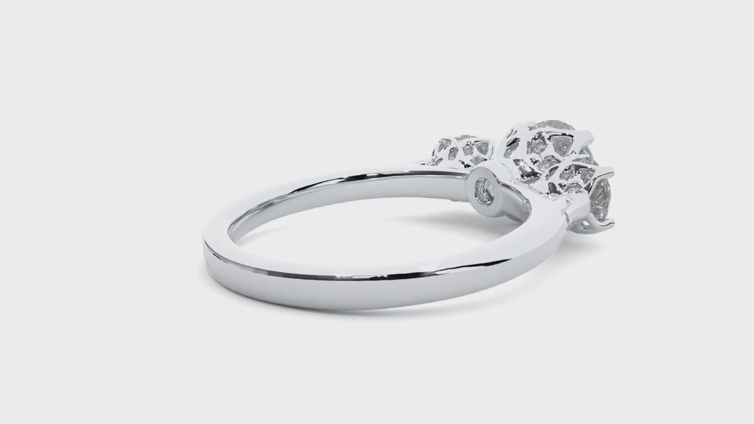ENGAGEMENT RING SET WITH THREE ROUND SHAPE DIAMONDS