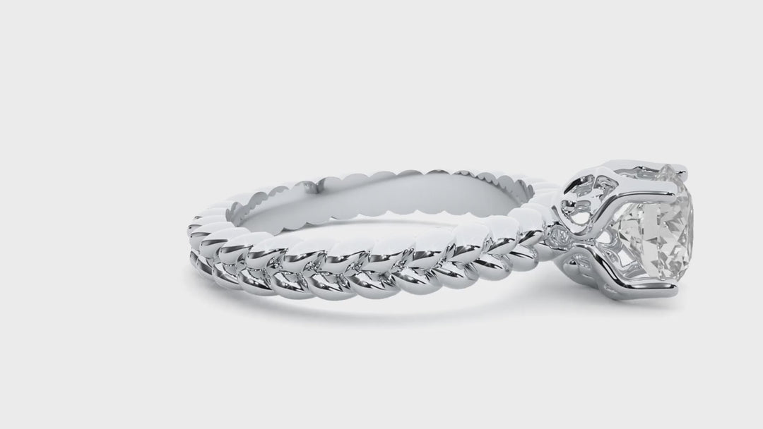 TWISTED TALES ENGAGEMENT RING SET WITH A 1 CARAT SOLITAIRE ROUND DIAMOND