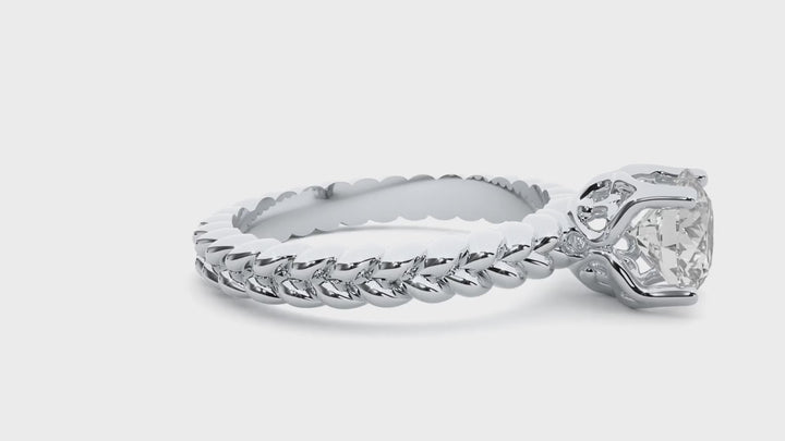 TWISTED TALES ENGAGEMENT RING SET WITH A 1 CARAT SOLITAIRE ROUND DIAMOND