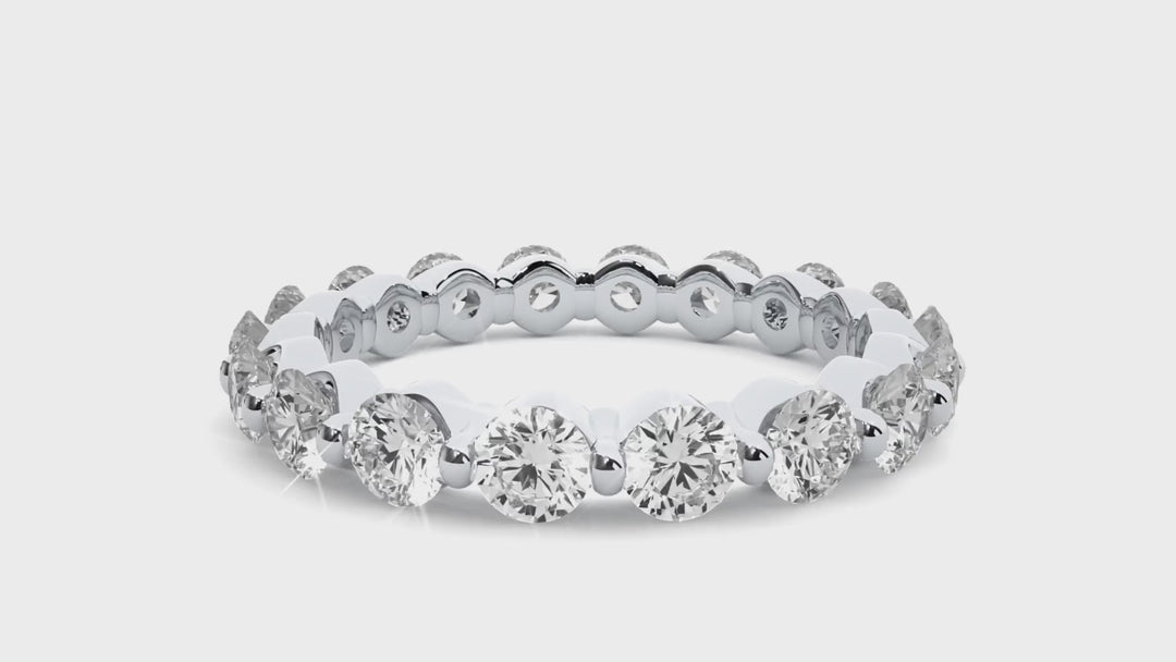 ETERNITY WEDDING RING STUDDED WITH 18 DIAMOND ROUNDS IN PRONG SETTING