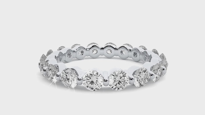 ETERNITY WEDDING RING STUDDED WITH 18 DIAMOND ROUNDS IN PRONG SETTING